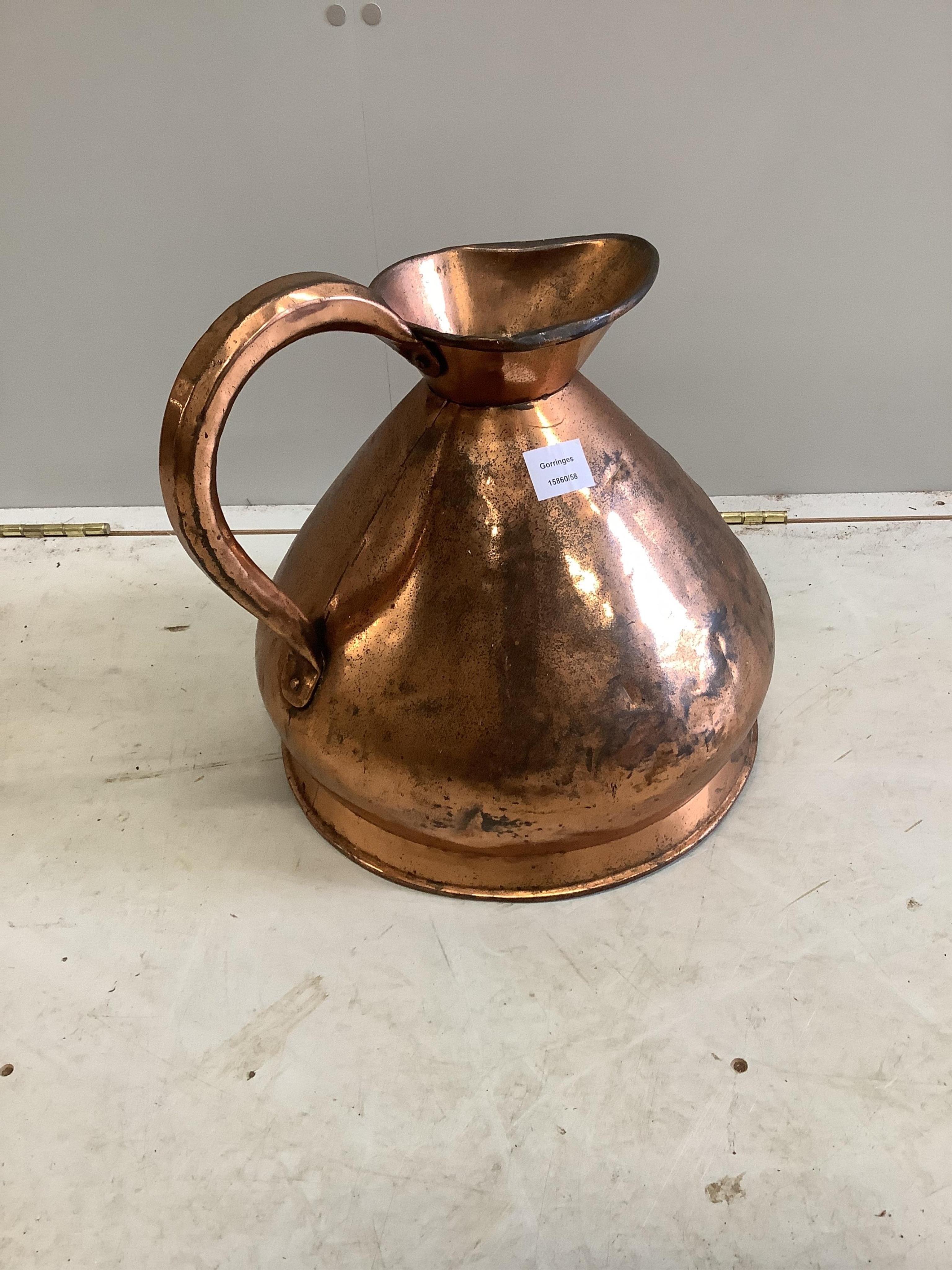 A Victorian copper measure, height 40cm. Condition - fair